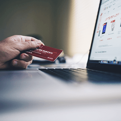 Online store and a hand with credit card