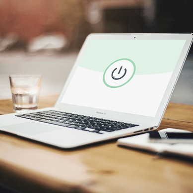 Laptop with power sign on the screen