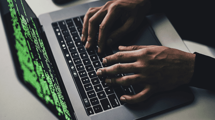 hands on laptop coding