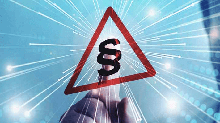 Graphic with paragraph sign in a red triangle
